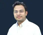 Dr. Anuj